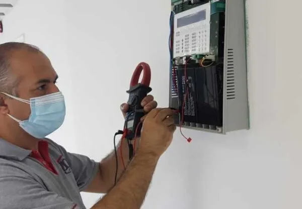 ZOD Protection technician conducting professional security system maintenance and inspection to ensure reliable protection and optimal equipment performance