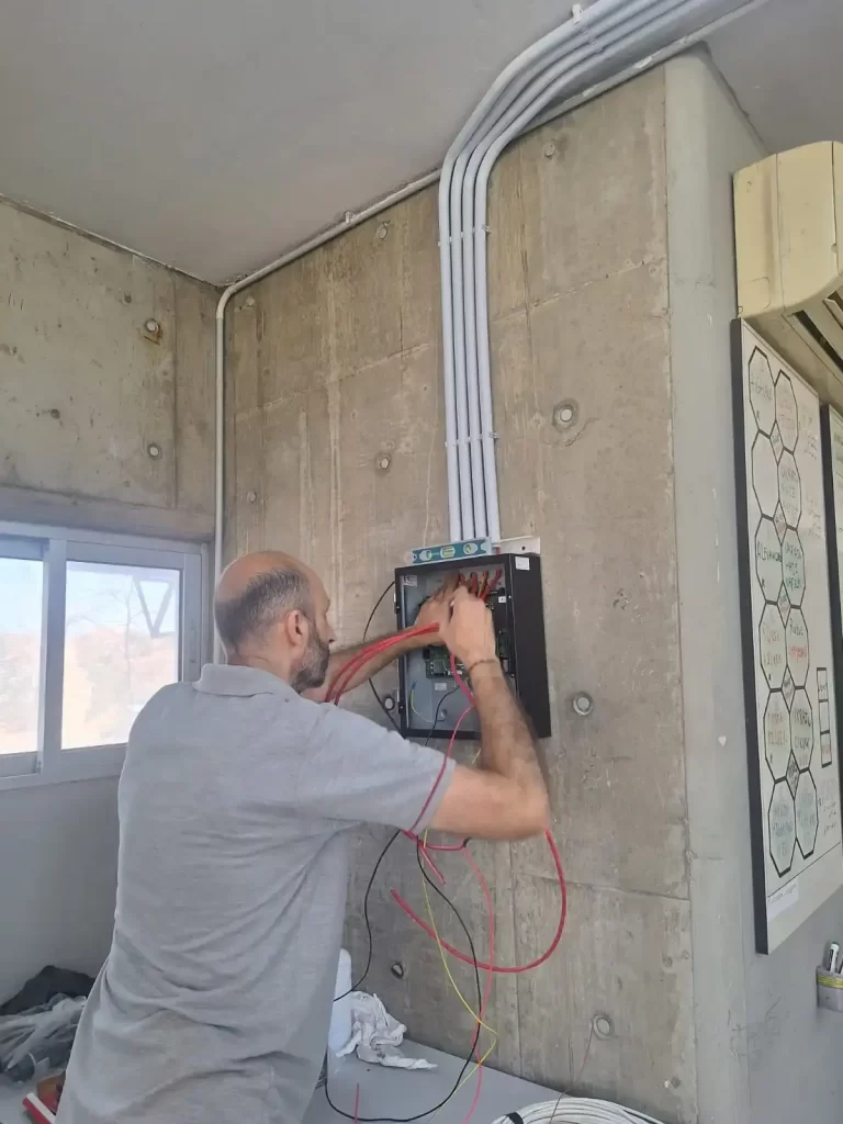 Technician maintaining a system