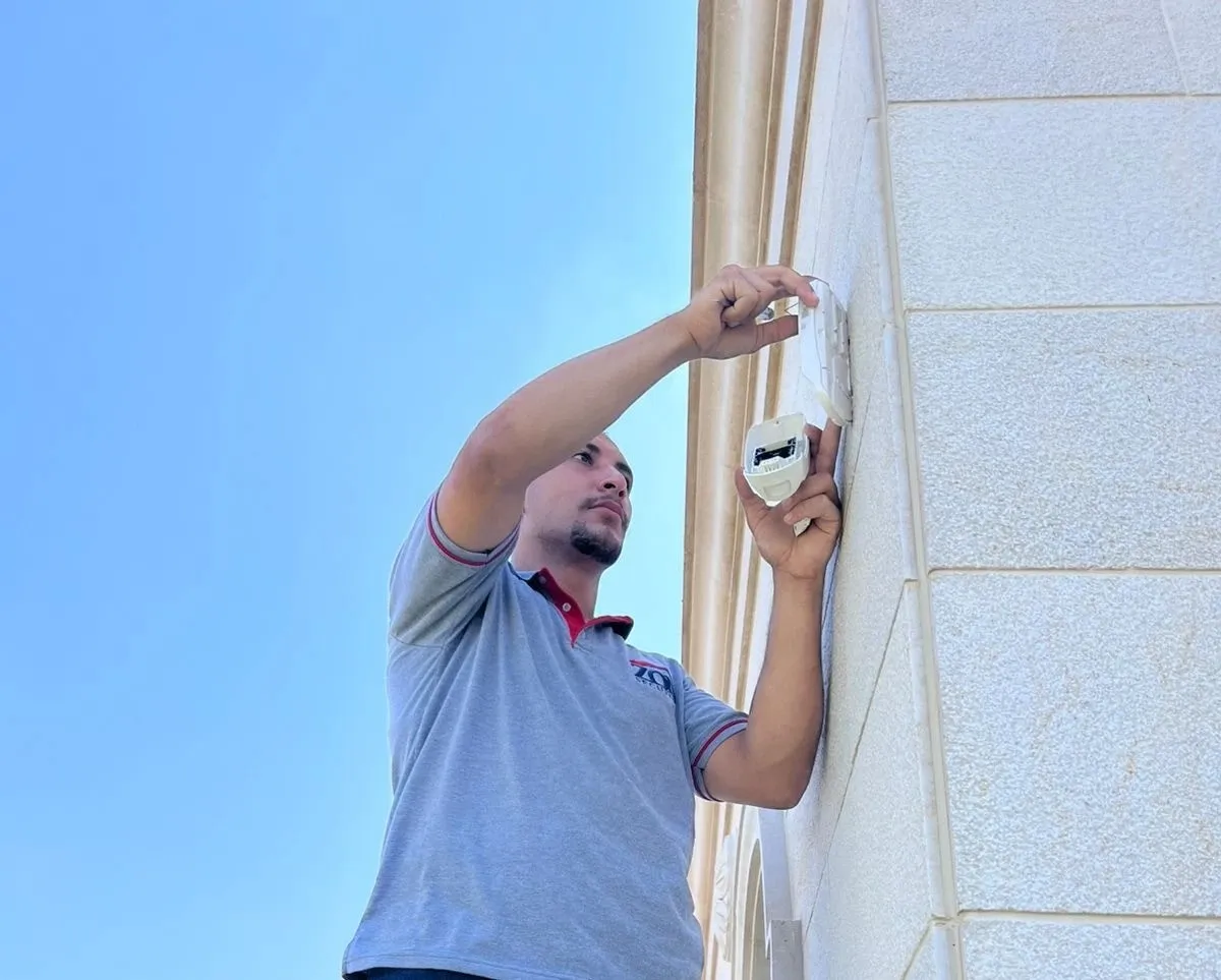 Professional ZOD Protection engineer installing security systems in Lebanon and UAE - expert engineering services for CCTV, fire detection, and surveillance solutions